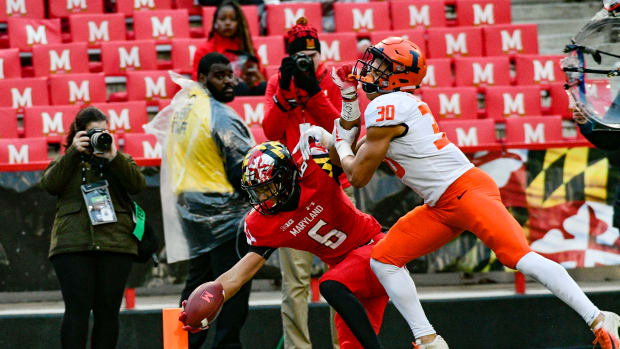 Oct 27, 2018; College Park, MD, USA; Maryland Terrapins wide receiver Jeshaun Jones (6) reaches for a touchdown as Illinois Fighting Illini defensive back Sydney Brown (30) defends during the third quarter at Capital One Field at Maryland Stadium. Mandatory Credit: Tommy Gilligan-USA TODAY Sports